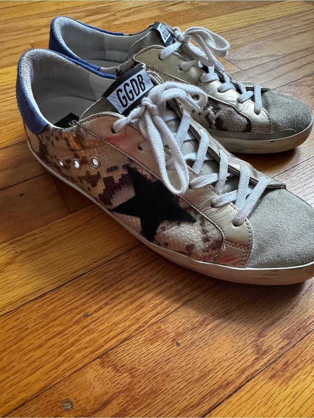Golden Goose Women’s Gold Snake-Print Sneakers with Black Star